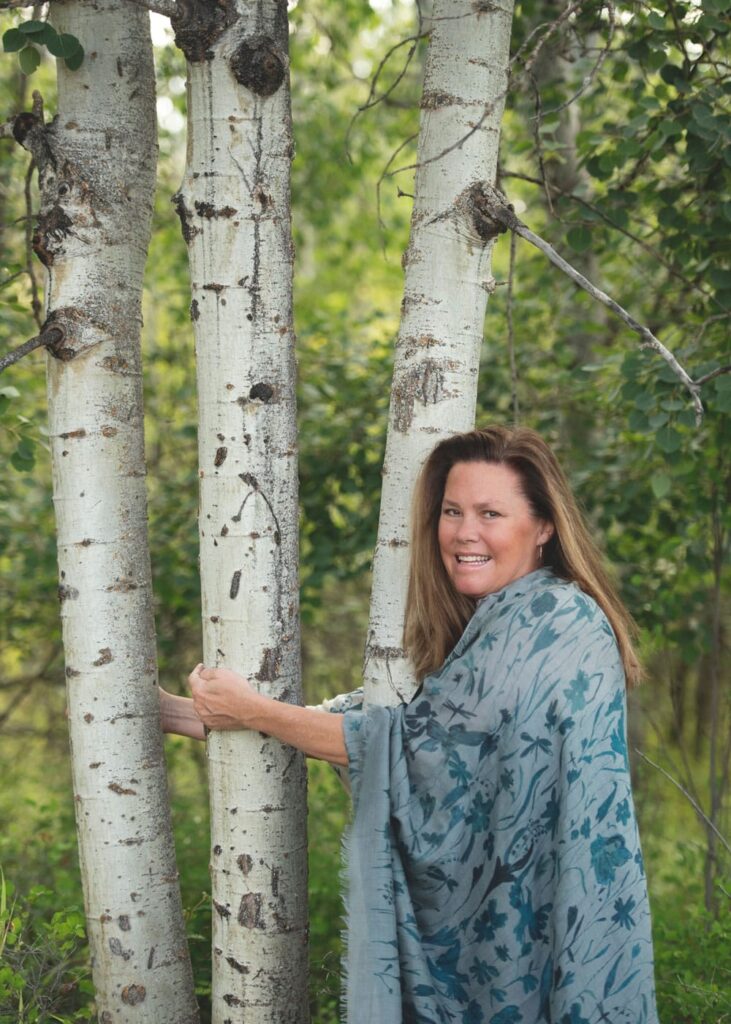 Laura hugging a grove